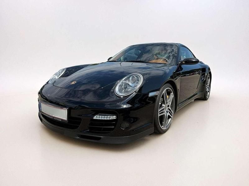 Schwarz Gebraucht 2006 Porsche 997 Turbo Coupé | € 109.900 - Bild 1/4