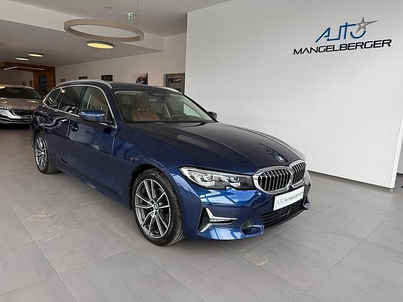Mediterranblau metallic Gebraucht 2020 BMW 320 Luxury Line Kombi | € 20.700 (Guter Preis) - Bild 1/4