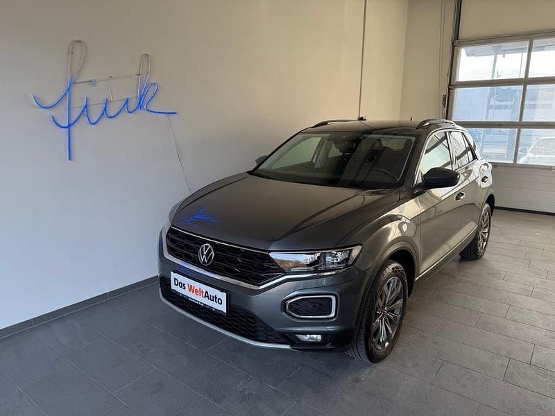 Dunkelgrau metallic Gebraucht 2020 VW T-Roc Design SUV | € 21.990 (Fairer Preis) - Bild 1/4