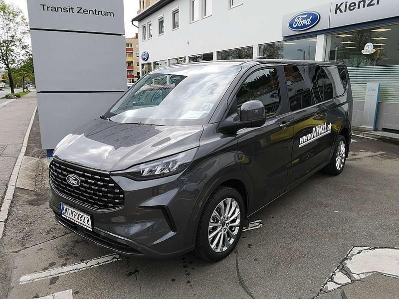 Grau Gebraucht 2025 Ford Tourneo Custom Titanium Van | € 62.990 - Bild 1/4