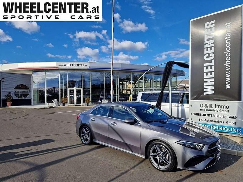 Grau Gebraucht 2023 Mercedes A180 AMG line Limousine | € 39.911 - Bild 1/2