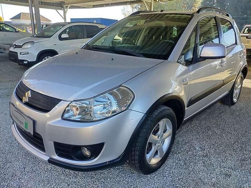 Silber Gebraucht 2007 Suzuki SX4 GL SUV | € 5.990 - Bild 1/4