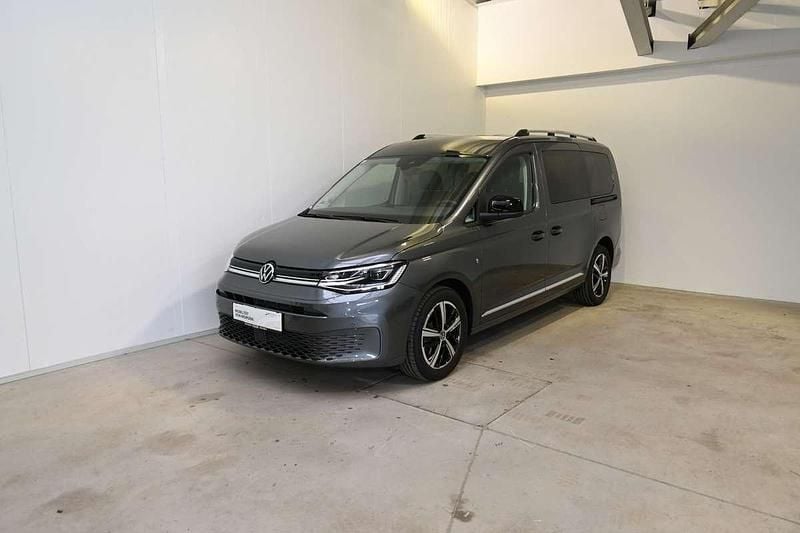 Mittelgrau metallic Gebraucht 2025 VW Caddy Maxi Style Van / Kleinbus | € 45.990 - Bild 1/4