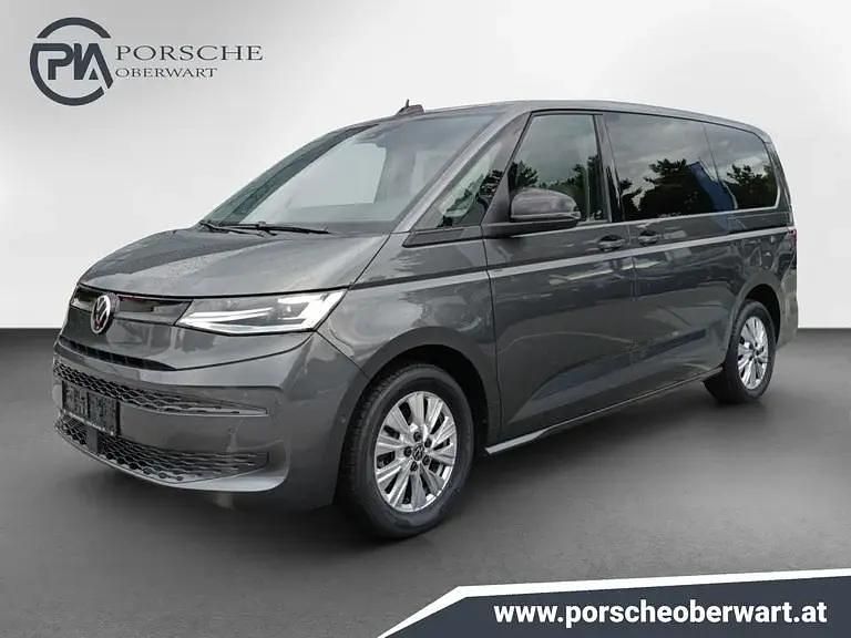 Mittelgrau metallic Gebraucht 2024 VW Multivan Business Van | € 59.990 (Fairer Preis) - Bild 1/3