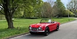 Rot Gebraucht 1961 Triumph TR4 Cabrio | € 20.750 - Bild 1/4