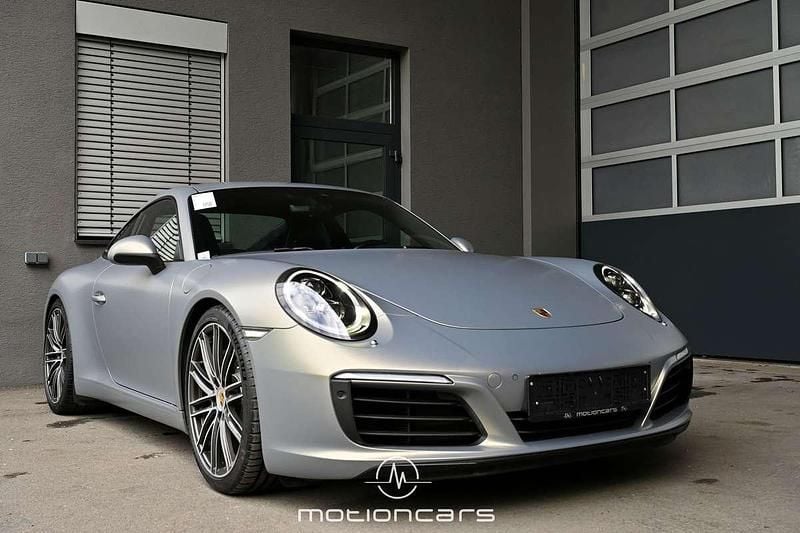 Silber Gebraucht 2018 Porsche 911 Carrera Coupé | € 109.880 - Bild 1/4