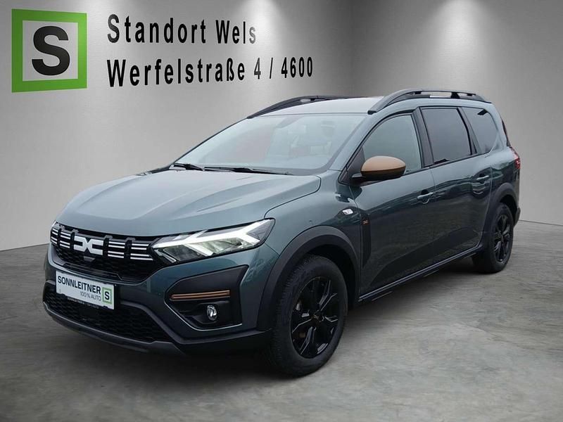 Grün Gebraucht 2023 Dacia Jogger Extreme Van / Kleinbus | € 22.990 - Bild 1/4