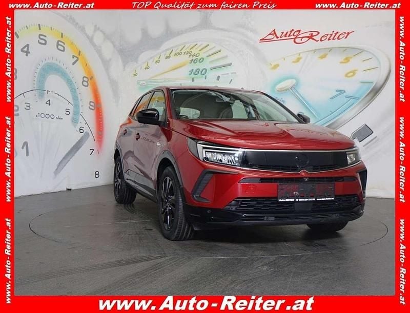 Bright red metallic Gebraucht 2024 Opel Grandland X SUV | € 26.890 (Fairer Preis) - Bild 1/3