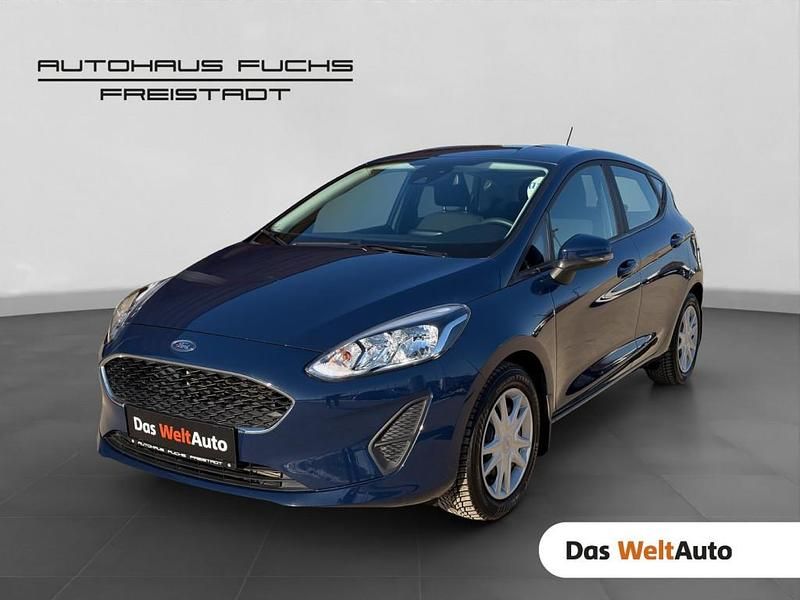 Mittelblau normal Gebraucht 2018 Ford Fiesta Trend Limousine | € 9.900 (Fairer Preis) - Bild 1/4