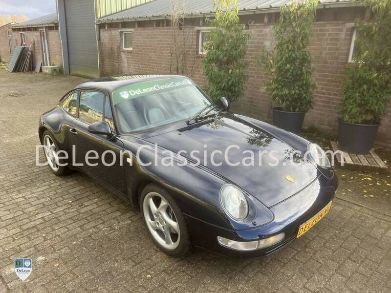 Blau Gebraucht 1994 Porsche 911 Carrera Coupé | € 62.950 - Bild 1/4