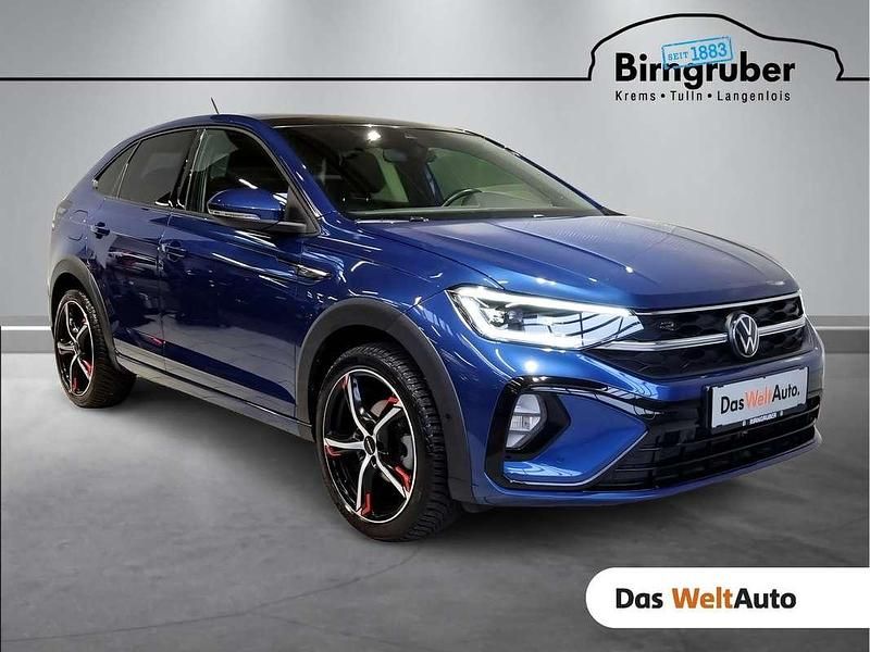 Dunkelblau metallic Gebraucht 2023 VW Taigo R-line SUV | € 27.990 (Fairer Preis) - Bild 1/4