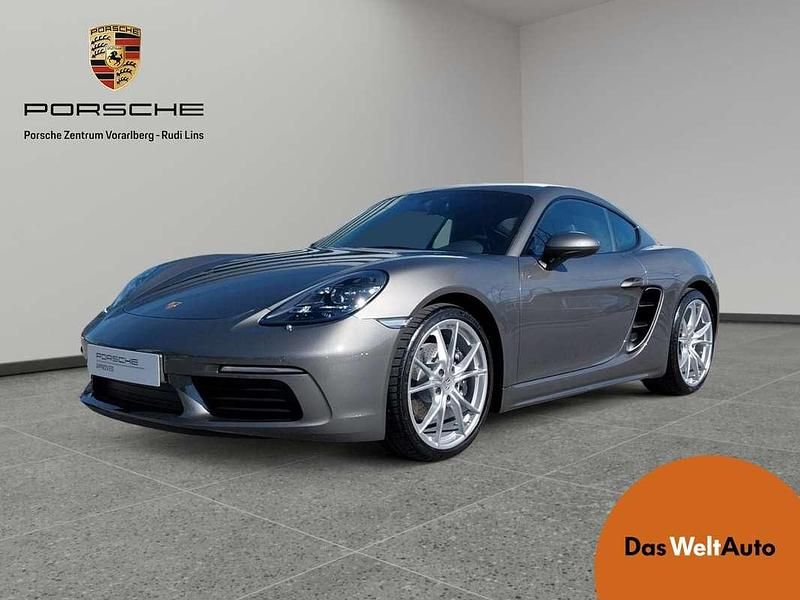 Mittelgrau metallic Gebraucht 2023 Porsche 718 Cayman Coupé | € 89.900 - Bild 1/4