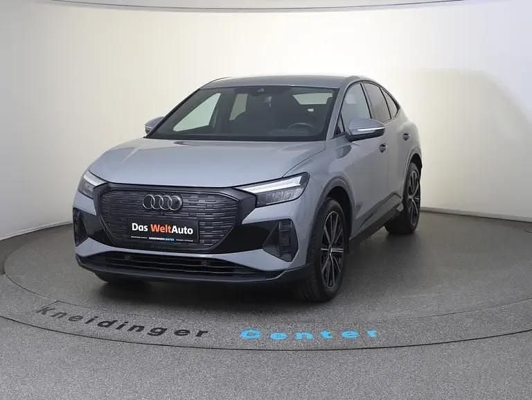 Mittelgrau normal Gebraucht 2023 Audi Q4 Sportback e-tron SUV | € 33.490 (Fairer Preis) - Bild 1/4