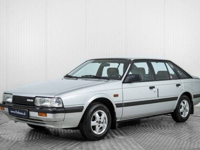 Grau Gebraucht 1983 Mazda 626 Limousine | € 9.900 - Bild 1/4