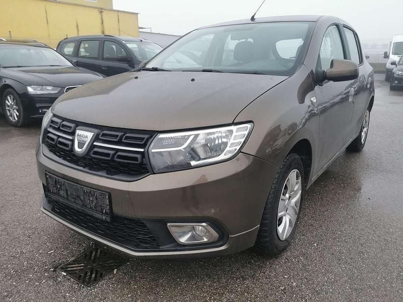 Braun Gebraucht 2017 Dacia Sandero Lauréate Kleinwagen | € 4.990 (Guter Preis) - Bild 1/4