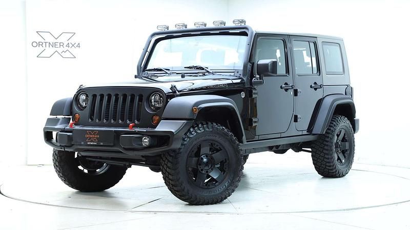 Schwarz Gebraucht 2011 Jeep Wrangler SUV | € 38.990 - Bild 1/4
