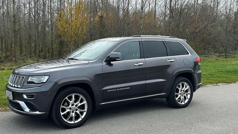 Grau Gebraucht 2015 Jeep Grand Cherokee Summit SUV | € 16.500 (Fairer Preis) - Bild 1/4