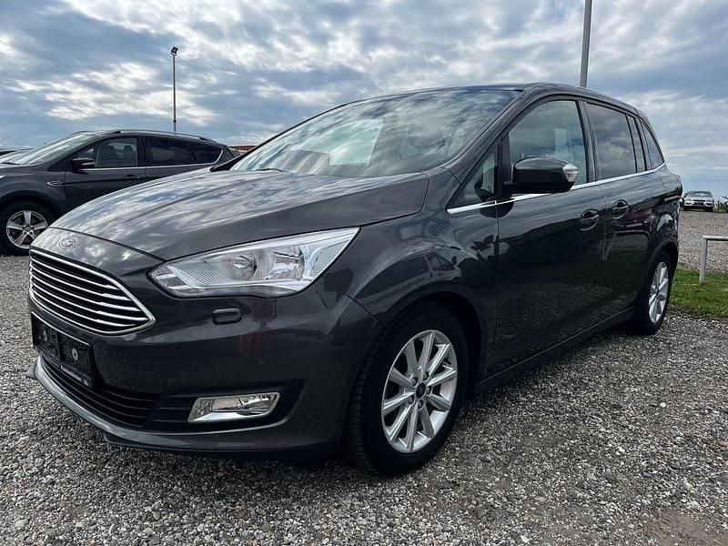 Grau Gebraucht 2019 Ford Grand C-Max Titanium Van / Kleinbus | € 19.590 (Teuer) - Bild 1/4