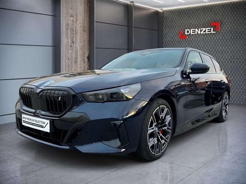 Gebraucht BMW i5 250 kW (340 PS) 2024 Tansanitblau ii meta Kombi