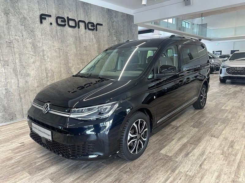 Schwarz metallicperleffektno Gebraucht 2024 VW Caddy Maxi Style Van / Kleinbus | € 46.990 - Bild 1/4