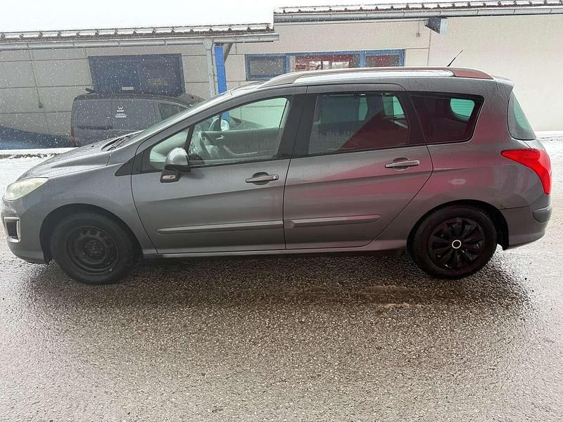 Gebraucht Peugeot 308 Premium 111 PS (81 kW) 2011 Grau Kombi