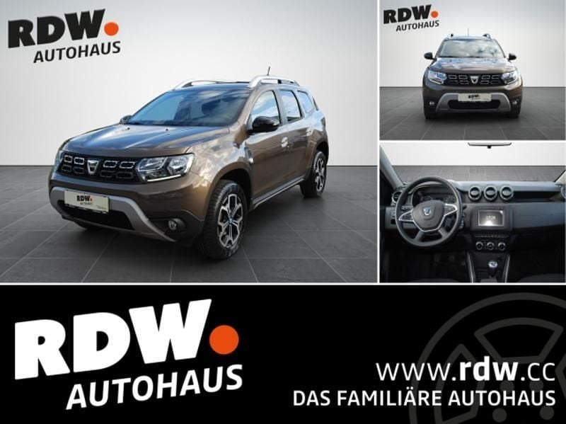 Braun Gebraucht 2021 Dacia Duster Celebration SUV | € 16.490 (Fairer Preis) - Bild 1/4
