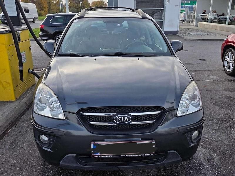 Grau Gebraucht 2009 Kia Carens Active Van / Kleinbus | € 3.000 - Bild 1/4