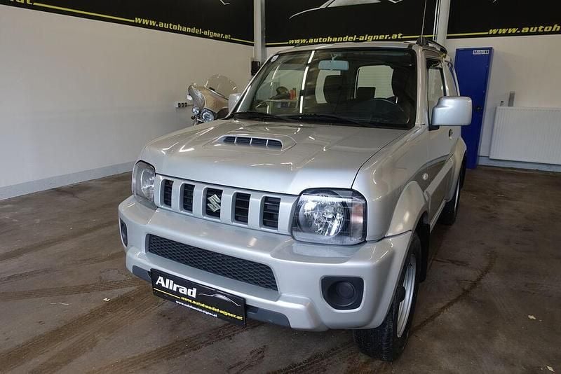Grau Gebraucht 2013 Suzuki Jimny SUV | € 13.900 (Fairer Preis) - Bild 1/4