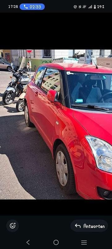 Rot Gebraucht 2010 Suzuki Swift Basic Kleinwagen | € 1.300 (Fairer Preis) - Bild 1/4