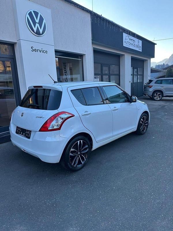Gebraucht Suzuki Swift 90 PS (66 kW) 2015 Weiss  normal Kleinwagen