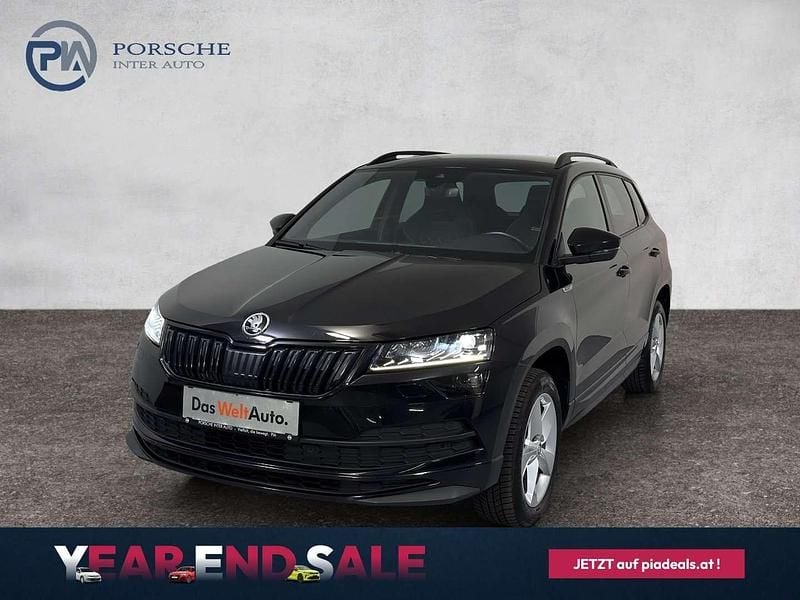 Schwarz metallicperleffektno Gebraucht 2020 Skoda Karoq SportLine SUV | € 28.990 - Bild 1/4