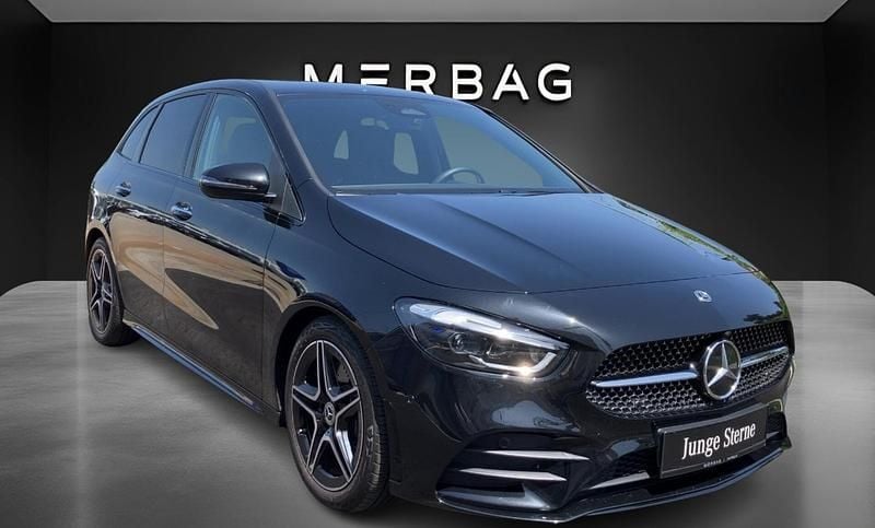 Gebraucht Mercedes B220 AMG line 190 PS (139 kW) 2024 Kosmosschwarz metallic Van / Kleinbus
