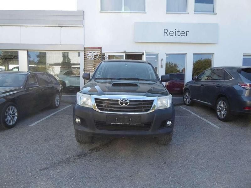 Grün Gebraucht 2015 Toyota HiLux Life Abholung | € 11.990 - Bild 1/4