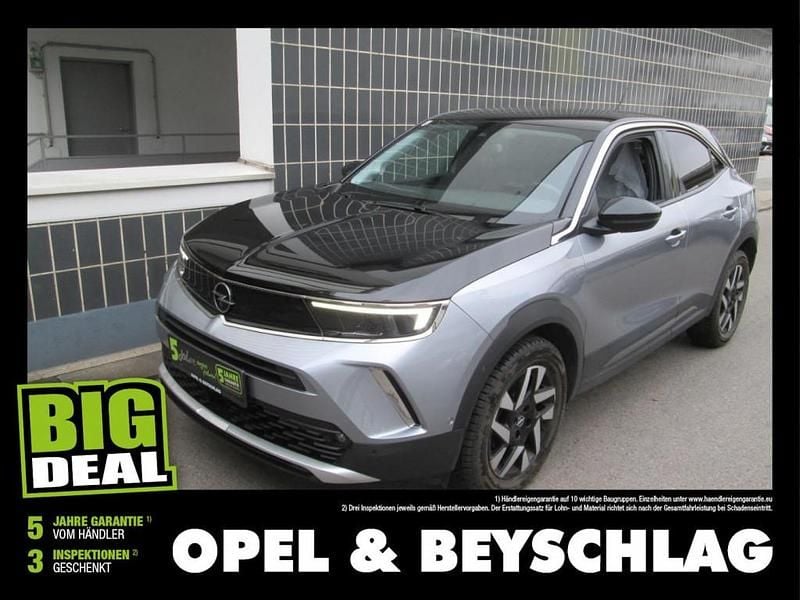 Quarz silber (m) Gebraucht 2021 Opel Mokka S SUV | € 18.380 (Fairer Preis) - Bild 1/4