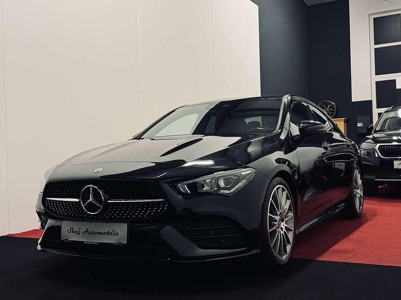 Schwarz Gebraucht 2022 Mercedes CLA200 AMG line Coupé | € 35.990 (Superpreis) - Bild 1/4