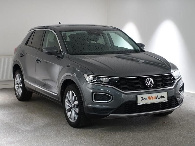 Mittelgrau metallic Gebraucht 2021 VW T-Roc Design SUV | € 19.990 (Guter Preis) - Bild 1/4