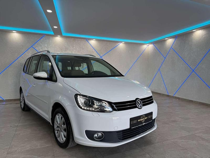 Weiß Gebraucht 2011 VW Touran Highline Van / Kleinbus | € 7.990 (Fairer Preis) - Bild 1/4