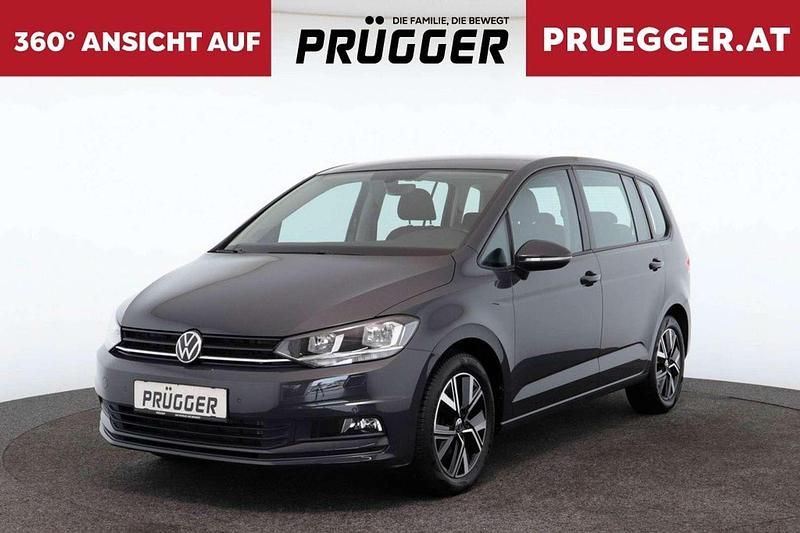Grau Gebraucht 2021 VW Touran Van / Kleinbus | € 26.990 (Fairer Preis) - Bild 1/3
