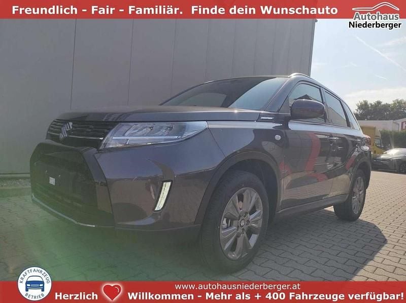Grau Neu 2025 Suzuki Vitara Comfort+ SUV | € 30.927 (Guter Preis) - Bild 1/4