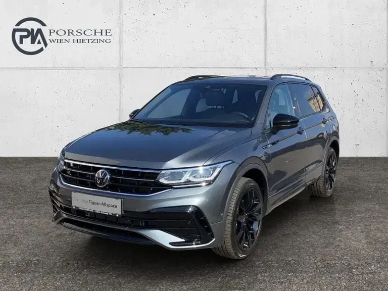 Dunkelgrau metallic Gebraucht 2024 VW Tiguan Allspace R-line SUV | € 49.990 (Fairer Preis) - Bild 1/4