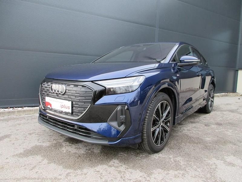 Dunkelblau metallic Gebraucht 2024 Audi Q4 Sportback e-tron SUV | € 49.990 - Bild 1/4