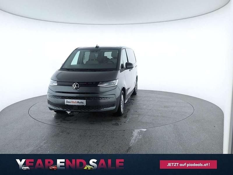 Mittelgrau metallic Gebraucht 2024 VW Multivan Business Van | € 54.950 - Bild 1/4
