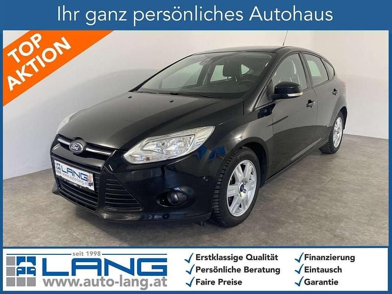 Pantherschwarz metallic Gebraucht 2014 Ford Focus Trend Limousine | € 6.990 (Fairer Preis) - Bild 1/4
