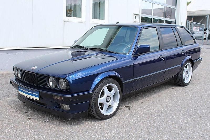 Gebraucht BMW 320 129 PS (94 kW) 1994 Blau Kombi