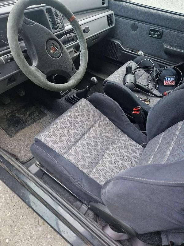 Gebraucht Rover 114 101 PS (74 kW) 1994 Schwarz Kleinwagen