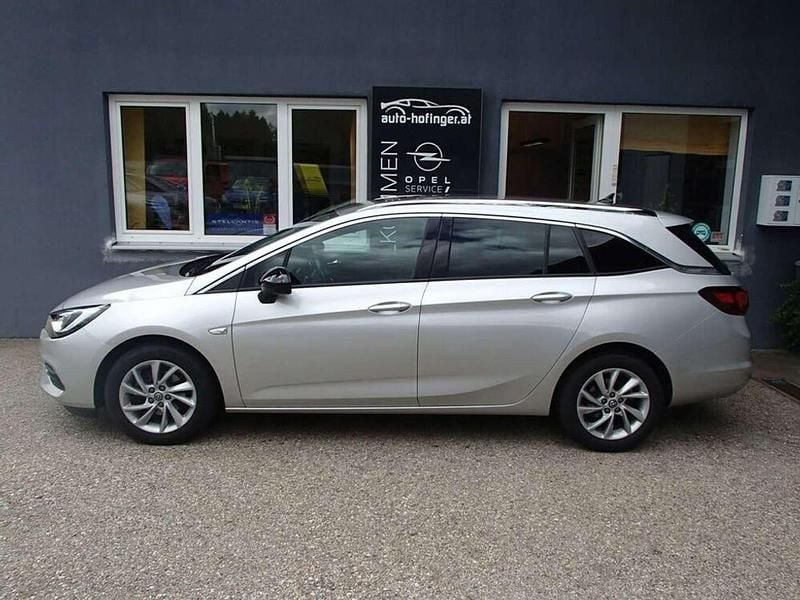 Silber Gebraucht 2021 Opel Astra Elegance Kombi | € 13.890 (Fairer Preis) - Bild 1/4