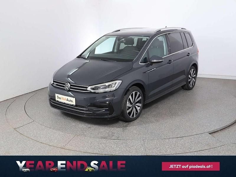 Mittelgrau normal Gebraucht 2024 VW Touran R-line Van / Kleinbus | € 47.950 - Bild 1/4