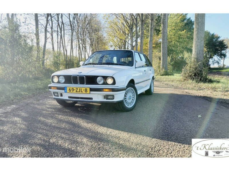 Weiß Gebraucht 1991 BMW 325 Comfort Edition Kombi | € 16.950 - Bild 1/4
