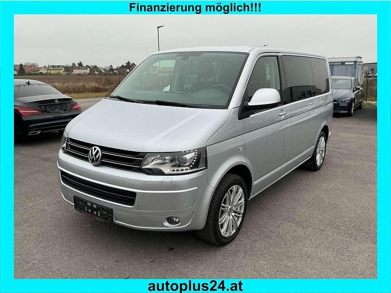 Silber Gebraucht 2014 VW Caravelle Comfortline Van / Kleinbus | € 19.990 - Bild 1/4