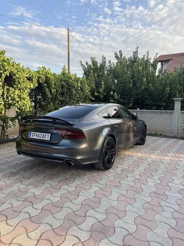 Grau Gebraucht 2012 Audi A7 Design Kleinwagen | € 18.000 - Bild 1/4